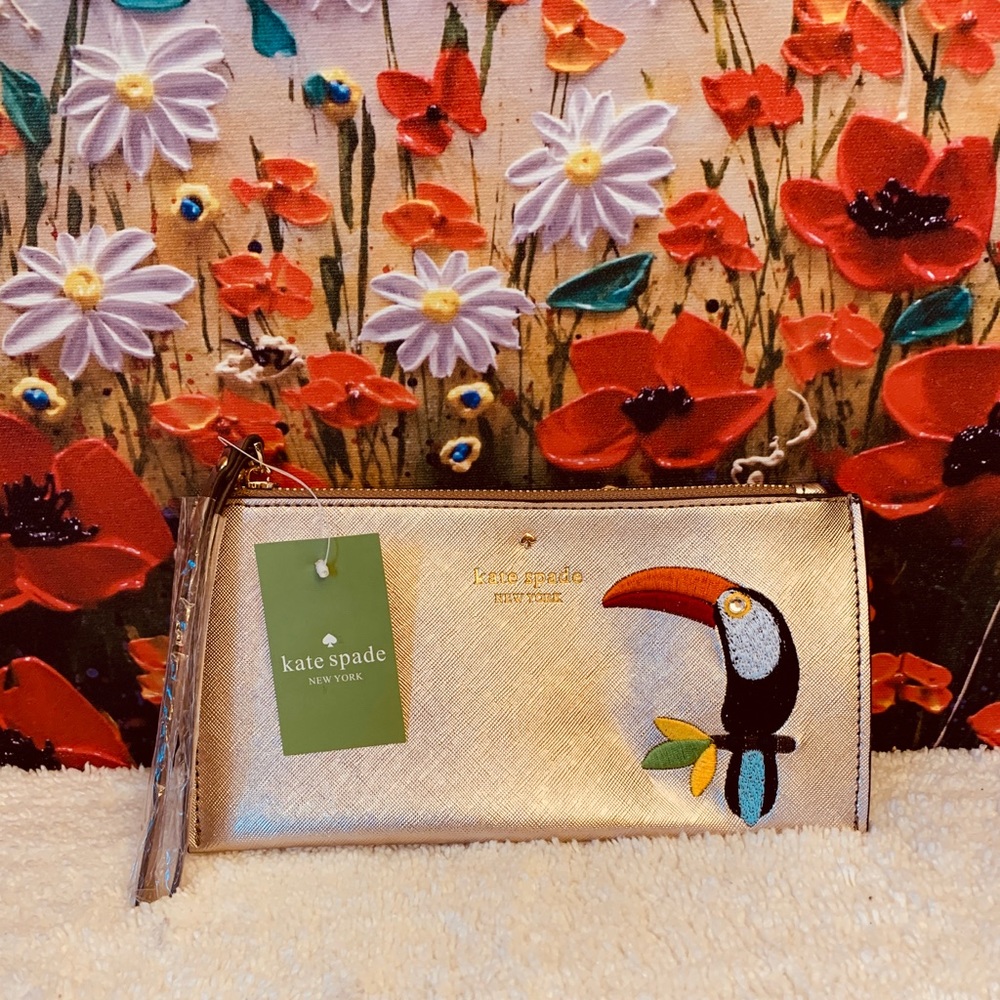 Authentic Kate Spade rosegold toucan wristlet